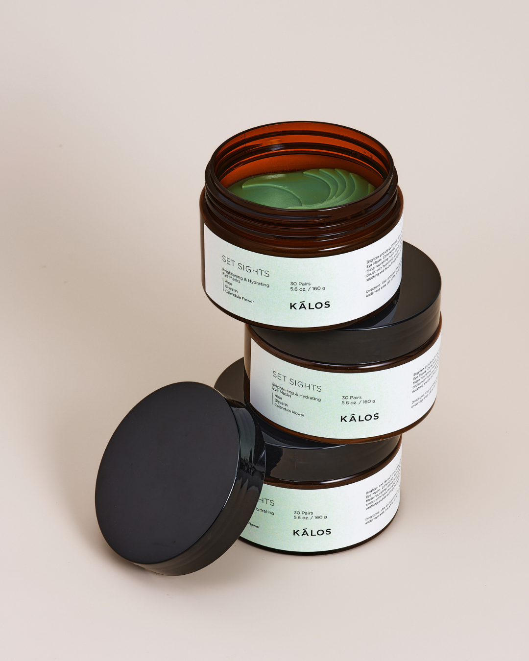 Brightening & Hydrating Eye Masks in a jar, showcasing Set Sights eye care product for enhanced under-eye beauty.